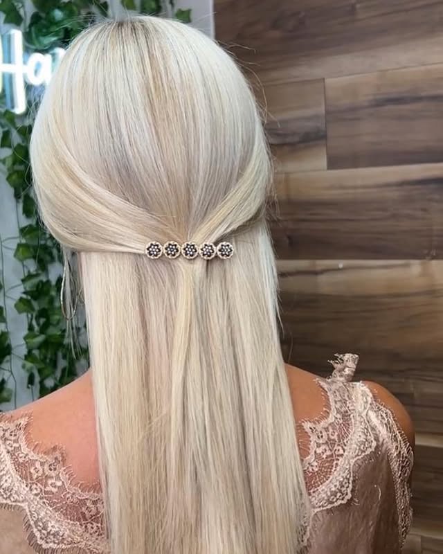Platinum blonde half-up with jeweled clip